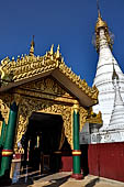 The main white washed stupa inside the cluster of pagodas that make up the Kakku pagoda complex. Shan State, Burma (Myanmar).